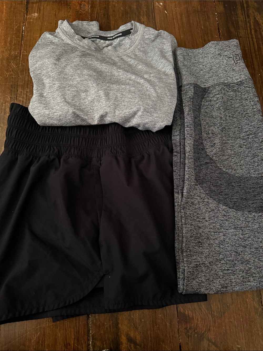 Black Athletic Layered Shorts with Gray Leggings and Nike top